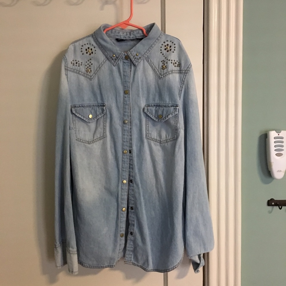 Denim shirt with gold studs on the collar